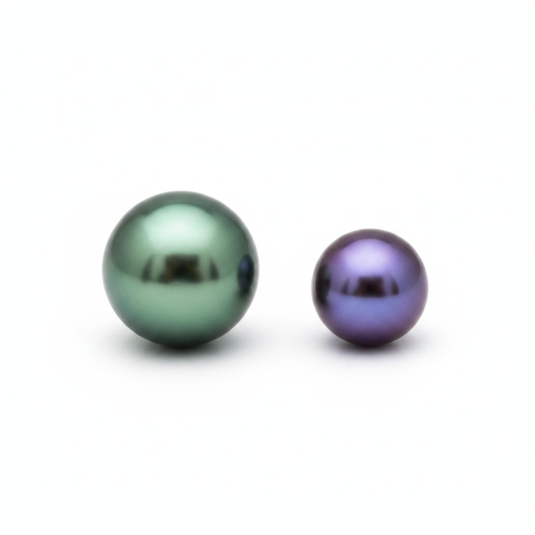 Edison pearl next to a 7mm pearl for size